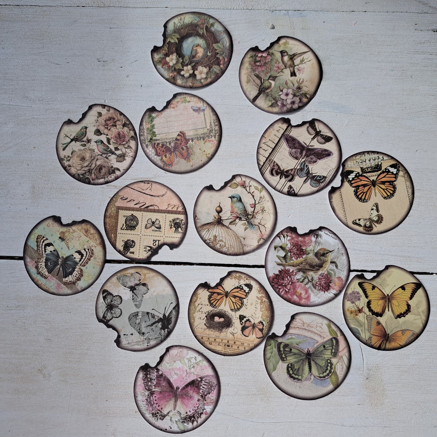 ronde stickerset met vogels en vlinders