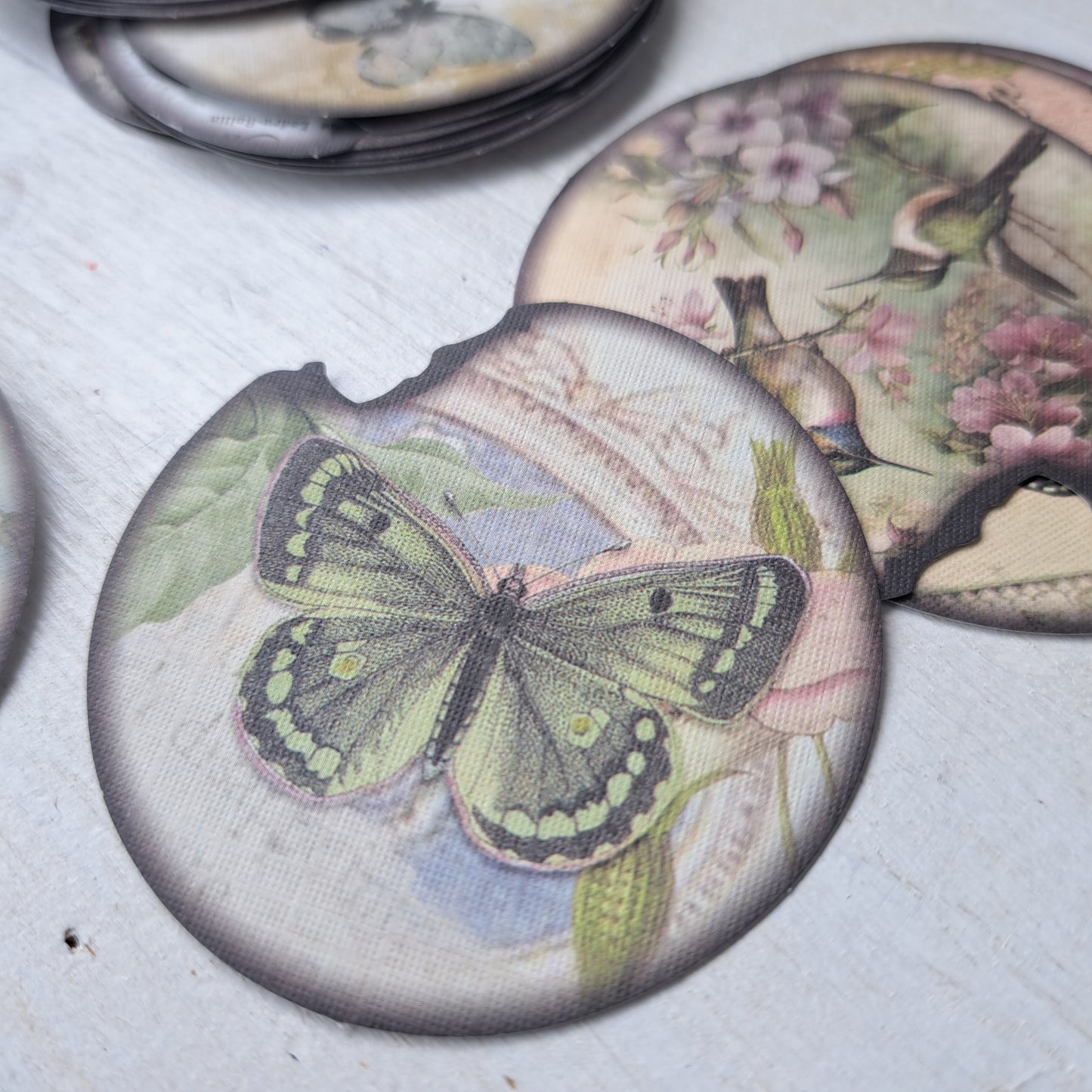 ronde stickerset met vogels en vlinders
