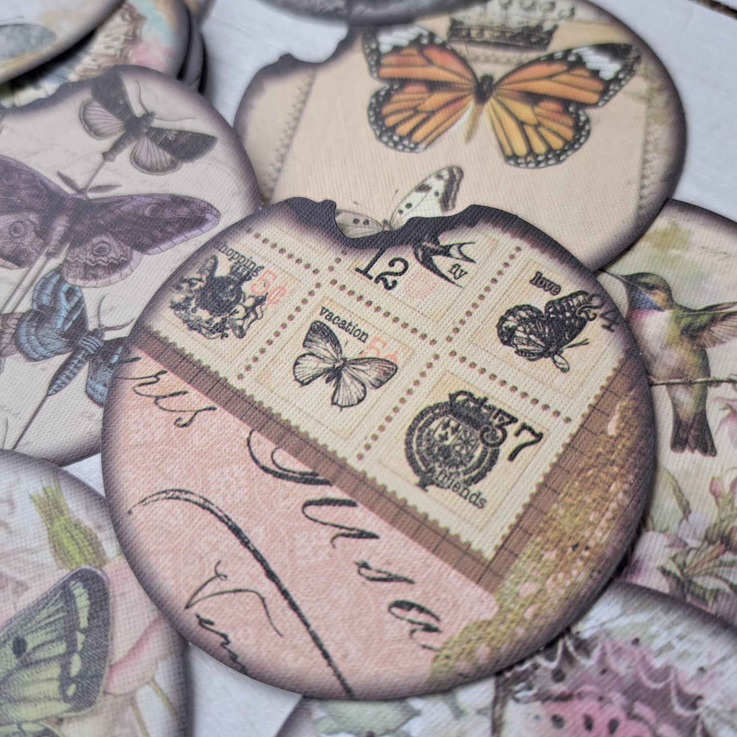 ronde stickerset met vogels en vlinders